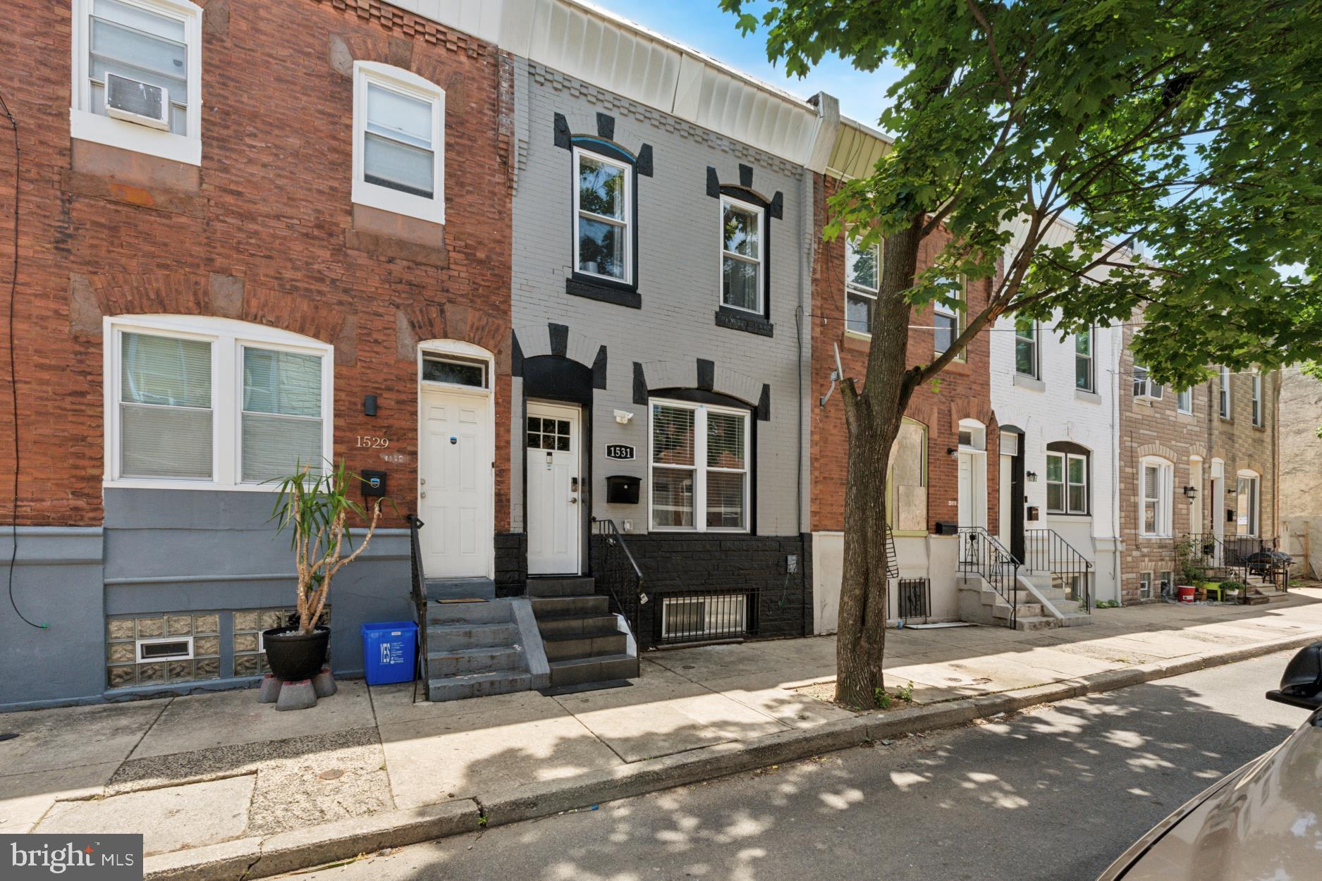 Located in Grays Ferry—featured on Curbed Philly’s “Top 5 Philly Neighborhoods to Watch”—this stunning 3-bedroom, 2-bath home blends modern luxury with urban convenience. High-end finishes include waterproof luxury vinyl floors, granite countertops, stainless steel appliances, energy-efficient windows, and sleek interior/exterior doors. Custom bathrooms. Additional highlights: Ring security system, efficient gas HVAC, private backyard, and unbeatable location—just minutes from UPenn, Drexel, the Art Museum, Center City, and I-76. Walkable to Point Breeze’s vibrant bars, eateries, and shops. SELLER'S ASSIST WITH DOWN PAYMENT & CLOSING COST!!!