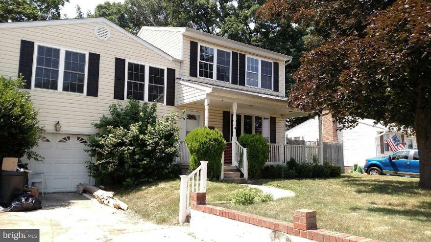 This is an awesome big house , with a little bit of sweat equity could be a beauty, Huge master bedroom with 2 walk in closets and another room that could be a master bath with a little imagination. 4 total bedrooms, over 1900 square feet with a garage and fenced yard. Lower level family room plus main level huge living room and kitchen with slider to back yard. SOLD AS-IS.