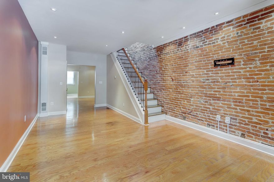 This fantastic Canton rowhome offers plenty of reasons to live here! The rear parking pad allows for a stress free end of the work day. Come and go as you please! 9 ft ceilings are accentuated with beautiful exposed brick walls and balanced with shining hardwood floors. No carpet here. The kitchen allows for plenty of space to prep and cook on the sparkling granite counters. You'll love entertaining in the formal dining room now that you have one. The main floor powder room eliminates unwanted trips up and down the stairs. With 2 generously sized bedrooms upstairs as well as a den or office, there is plenty of space to spread out. Full size laundry is in the basement and there is a ton of space for dry storage down there. There are numerous corner restaurants within a 2 block radius or take an 8 min walk to O'Donnell Square for even more options. Enjoy running or biking? Patterson Park is even closer. Don?t miss out on this great home. For applications please email BHpropertiesMD@gmail.com