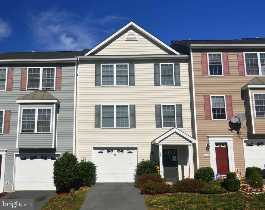 NEW PRICE, 2-YEAR HOME WARRANTY AND $5,000 TOWARD CLOSING COSTS! HAVE IT ALL! BEAUTIFUL 3-LEVEL TOWNHOUSE  WITH A GAS LOG FIREPLACE, GARAGE AND A COMMUNITY SWIMMING POOL! Just east of Winchester and commuter convenient to I-81 and Rt. 7, shopping and services. An easy drive to Dulles Airport and Northern  Virginia.  Welcome to Windstone, a community with a fenced outdoor pool and plenty of places to walk.  3 bedrooms, 2 1/2 baths, including a primary suite with its own bath and a walk-in closet. Hardwood floors main level. Wood-look laminate in the bedrooms. Spacious living room. The kitchen offers a dining area, island and walk-in pantry. Enjoy your morning coffee or grilling dinner on the relaxing back deck. Appliances convey, including washer and dryer in the large, entry-level laundry room.  Seller is offering $5,000 toward closing costs and other lender-allowed charges, plus a 2-year American Home Shield home warranty.  HOA includes mowing and snow removal. Buyers pay a setup fee of $70 to the HOA  at settlement.  Sold as-is.