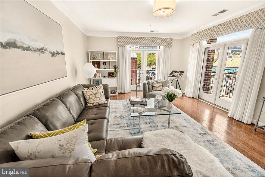 Live in Historic Downtown Frederick in a prime corner condo overlooking Carroll Creek. Come
discover this stunning, fully renovated and beautifully decorated 2 bedroom 2 bathroom condo
with a versatile bonus den/office/guest bedroom and 2 private balconies.
The spacious light filled open concept living dining area is perfect for entertaining. The new
high end stainless steel appliances are a cook's dream. Designer lighting, upgraded flooring
and luxury finishes throughout.
The large primary suite has an en suite bathroom and a custom designed walk in closet. The
guest bathroom had a luxury remodel. Large laundry room with full size washer and dryer plus
extra storage. A separate storage area is easily accessed on the lower level.
No need to worry about parking as this unit is one of the few that comes with 2 deeded
conveniently assigned parking spaces. Enjoy the perfect combination of modern luxury and
historic charm with shops, restaurants, galleries, theaters, cafes and parks just steps from your
door. 
Don’t miss out. Prime corner condos overlooking Carroll Creek are rare and do not come
on the market often.