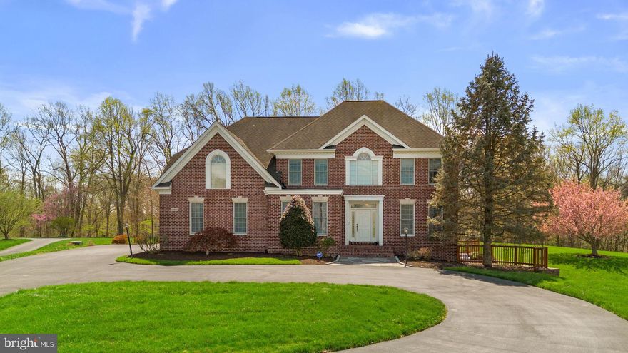 Stunning brick colonial now available in the highly the sought-after Glenelg community The Warfields. With over three picturesque acres, this beautifully maintained property offers generous space both inside and out.

Step inside to a dramatic two-story foyer, flanked by a formal living room and elegant dining room. The home flows into a spacious gourmet kitchen featuring a butler’s pantry and custom bar—perfect for entertaining. A main-level office provides flexibility and can easily serve as an additional bedroom. The inviting family room showcases a soaring stacked-stone fireplace that extends to the second level. A half bath finishes the level.

Upstairs, the expansive primary suite offers a luxurious retreat with a spa-like bath, including a soaking tub, walk-in shower, and a large walk-in closet. Three additional bedrooms, two full bathrooms, and a convenient laundry room complete the upper level.

The unfinished basement provides abundant storage or future finishing potential. Outdoors, relax on the rear patio overlooking a serene pond and professionally landscaped yard with a beautiful water feature.  Enjoy exercise by utilizing the community tennis courts and playground. Ideally located with easy access to shopping, dining, and major commuter routes.