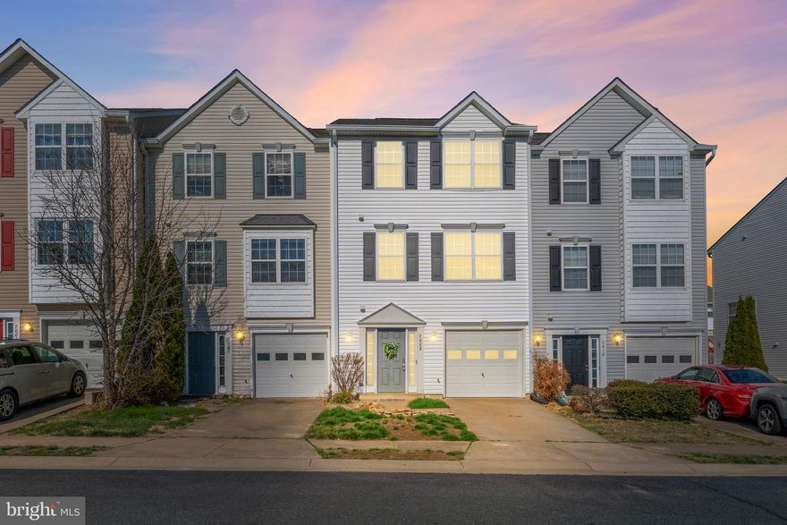 This spacious Salem Fields townhome presents an excellent opportunity to personalize and build equity. One of the larger models in the community, the home offers generous living spaces across three finished levels along with a fenced backyard and deck—ideal for outdoor relaxation or entertaining. The large kitchen provides an open, welcoming space for friends and family to gather and flows nicely with the surrounding living areas. The well-designed layout offers a great foundation for updating finishes to suit your personal style while enjoying a fantastic neighborhood location.
The roof was replaced in 2010 and a water heater installed in 2023. Conveniently located near shopping, dining, commuter routes, and everyday amenities, the home also enjoys access to the Salem Fields community amenities including pool, clubhouse, walking trails, and playgrounds.