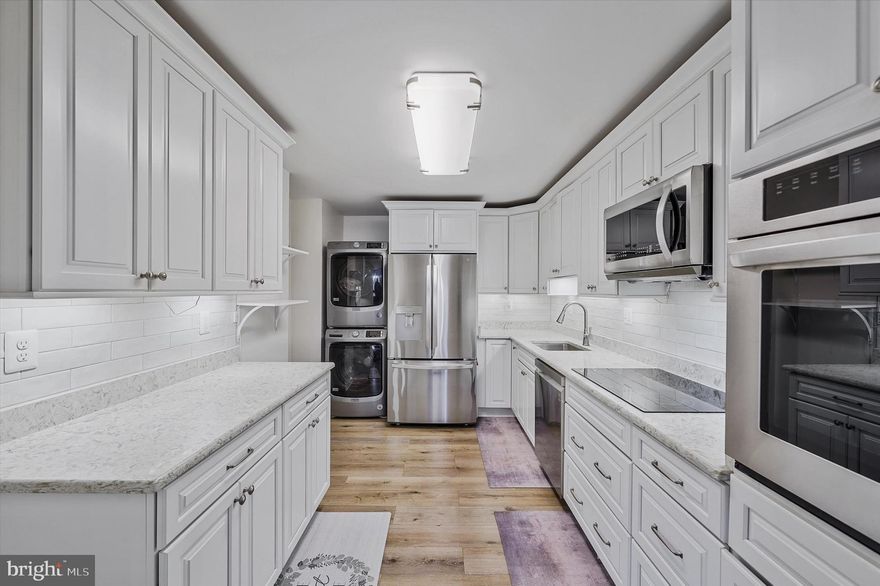 Fully Renovated Corner Unit at Watergate at Landmark
Beautifully updated unit with quality finishes and rare underground garage parking included. Enjoy a 14-ft private balcony overlooking a quiet, park-like setting. Light-filled corner layout with spacious rooms, upgraded LVP flooring with cork backing, extra kitchen built-ins, and a bay-style window in the second bedroom.


All utilities and full access to Watergate’s extensive amenities included in condo fee: indoor and outdoor pools, 10 pickleball courts, fitness center, saunas, tennis (indoor & outdoor), racquetball, library, community center, walking/jog path, tot lot, picnic areas, on-site restaurant and convenience store, free shuttle to Van Dorn Metro, and more.
Prime location inside the Beltway—just over a mile to Metro and minutes to the Pentagon, Old Town, and D.C.