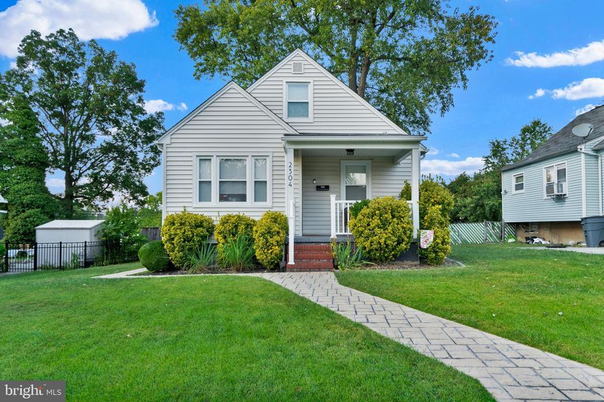 Life is sweet in the northeast! This porch front cape cod warmly welcomes you home with character & charm. First notice the stamped concrete walkway then the covered front porch with new railings, a perfect space to relax with views of the Lauraville neighborhood. This home is deceptively large. Entering the front door you're greeted with gleaming hardwood floors of varying wood stain & an open floor plan to the dining area & kitchen at the rear. You can see this home was made to entertain. The kitchen is finished with stainless steel appliances, marble counters, & glass tile backsplash. The breakfast bar has seating for 3 or more & is draped in pendant lighting. There are two main level bedrooms with carpeted floors. There is a tiled bath on each floor. The main level bath has a large tile shower with bench. The upper level is a third bedroom with a private tile bath perfect for relaxing. The upper level bath has tile floors, tub shower combination, & additional storage with a medicine cabinet. The basement is finished with a large family room, carpeted floors, & full bath with a stall shower. Storage is plentiful with a front storage room & rear utility room. Exit to the rear yard through the basement level or kitchen to a concrete patio with a large fenced yard & shed. Have peace of mind with a modern french drain waterproofing system, updated utilities, & new vinyl siding. This home has been lovingly maintained to a high standard.