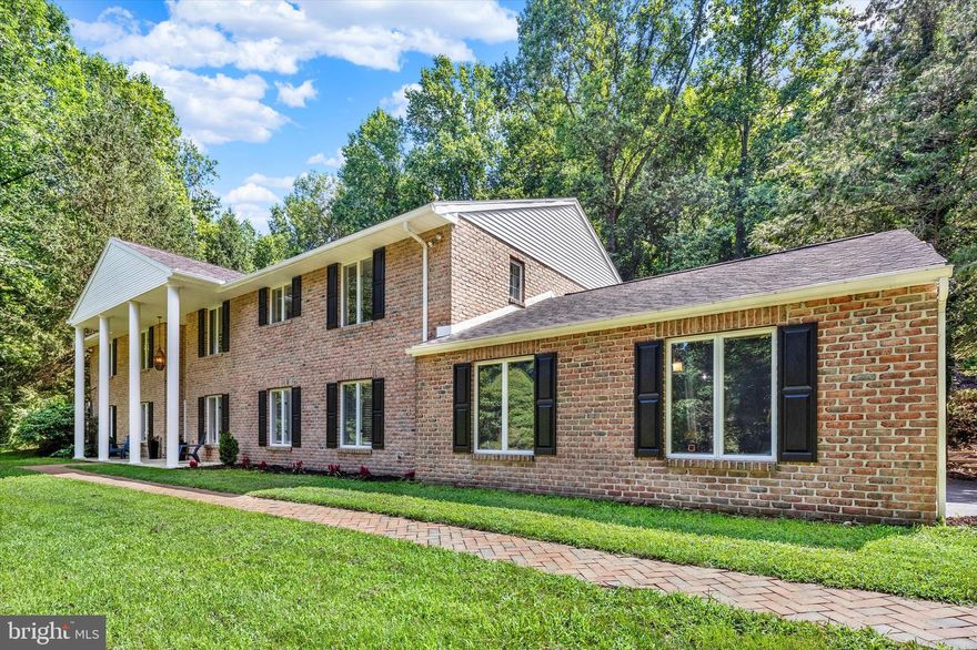 You must see this beautiful, spacious, solid brick, 4 bedroom, 4 bathroom home located on a private and wooded 1.82 acre lot in Governor Mifflin School District! Enter through an impressive open foyer with imported tile flooring and an impressive solid oak spiral staircase. A spacious open lower level would make the perfect in-law or guest suite, with a large bedroom, full bathroom, and dedicated living area/media room with lots of windows, recessed lighting, custom built-ins, and new flooring. Upstairs, which can also be accessed from the lower level via a second staircase, has been meticulously updated with new wood flooring and fresh paint throughout. The attractive eat-in kitchen is also sure to impress with its custom cherry cabinets, built-in appliances, and new quartz countertops, and it flows nicely into the formal dining room that is complete with chair rail molding. Next, the sizable formal living room boasts beautiful custom built-ins, and a large bow window that brings in lots of natural light. You will also find a family room/den with an impressive stone wood-burning fireplace and sliding glass doors to the backyard that is sure to become your favorite room in the house. Also on this main level you will find three additional bedrooms with the master bedroom suite having exterior glass doors leading out to the back deck, three full bathrooms, two completely renovated and the third updated with a new vanity, and a convenient main floor laundry room with a utility sink and a door to the outside. You will also fall in love with the outside! The backyard is completely private with a gorgeous wooded backdrop plenty of space for entertaining or play. And I should also mention that this home was constructed with quality local Glen-Gery brick, and includes a 2-car side entry garage, a long driveway, a turnaround space, and an additional drive area along the top of the property for plenty of parking. There is also a huge storage space on the lower level that could continue to be used for storage, or that could easily be finished to add another 1,000 sq ft of living space to the lower level. Other notable features of this great home include: a newer roof (2015), newer central HVAC (2020), 2 new split units added downstairs (2024), newly remodeled bathrooms (2025), 4th full bathroom added downstairs (2023), newer hot water heater (2021), new insulation in attic (2024), updated lighting (2024), and newly installed back deck (2025). And, to top it off, a one-year Cinch home warranty is included for your peace of mind! Call today for your private showing!
