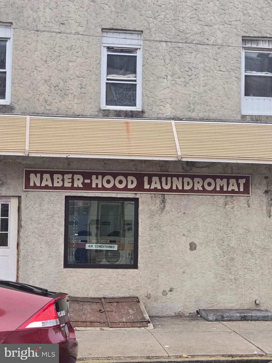 This Naber-Hood city laundry service has been in operation at this location for many years and produces an income that will keep you happy for many years to come! Offered for sale are both the laundry business including all equipment and good will as a great corner building that includes two garages. Also, a 2-bedroom apartment on second level that rents for 1,195. month. This is a turnkey operation! Great family business opportunity.