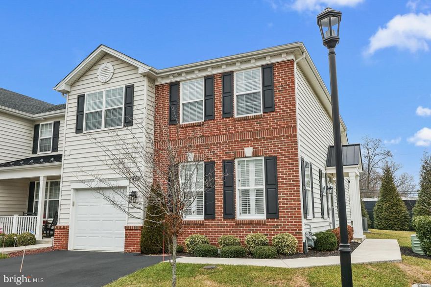 Opportunity knocks in the 4-year young END UNIT at St. Joseph’s Court! Located in Falls Township with low taxes, this 55+ community is perfectly situated with all the carefree conveniences you desire! Your private side entry opens into a beautiful space loaded with upgrades! The main level offers a huge living room with ventless gas fireplace, overhead recessed lighting, and generous windows. The dining room is big enough to enjoy larger family get-togethers while utilizing your gourmet kitchen that features upgraded white cabinetry, breakfast bar island with pendant lights, upgraded stainless steel appliances, pantry closets, granite counters, and tiled backsplash! There is also space for your table and chairs or a reading nook. The sliding door leads to a beautiful 12 x 20 paver patio for summer relaxation and grilling! The main level boasts a spacious owners’ suite bedroom that includes a large walk-in closet and upgraded en-suite bath with lovely cherry cabinetry! A convenient laundry room, also on the main level, offers tiled floor, upgraded cabinetry, granite countertop, and a sink which can be used for hand washables or as a wet bar when entertaining! The upper level of this home is amazing with two gigantic bedrooms, a full bath, a utility room, plus a heated and air conditioned 12 x 19 room that can serve as the perfect media room, craft/hobby room, an office, or additional storage. A one-car garage, gas heating and cooking, engineered hardwood floors, screen door with hideaway screen, custom blinds and shades, plantation shutters, and stained wood staircase with carpet runner are just a few more of the highlights of this turnkey, professionally landscaped home! The community clubhouse offers an exercise room, gaming room for cards and mahjong, and a full-service kitchen and recreation room for entertainment! The time is right to take advantage of this opportunity to live THE ‘good’ life!