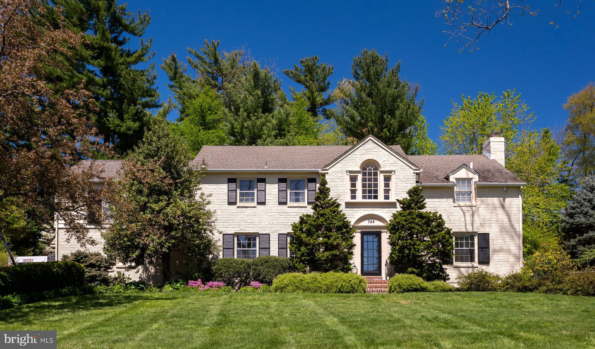 Don’t let the address fool you. This Conestoga Road home sits far back off the main road down a long driveway on a private interior lot that backs to the prestigious Agnes Irwin School for Girls and the much-desired Browning Lane neighborhood. On the opposite side of the drive across Conestoga Road is the Boxwood Road neighborhood, which has many luxury homes and is a great place to take an evening stroll. 745 Conestoga Road is a lovely traditional expanded brick colonial-style home with a layout that will surprise you. The heart of the home is the spacious kitchen with high-end stainless appliances and abundant storage space. Opening to an oversized family room with a stately fireplace, the kitchen has a large island food prep workspace offering guests seating as they watch the host make a delicious meal come to life! Walls of windows grace the family room, drawing in natural light and looking out onto the lush 1.4-acre lovingly kept backyard with a personal pool and spa. In addition to its captivating features, this residence boasts an in-ground pool, offering a refreshing retreat for relaxation and recreation right in your backyard. The in-law suite provides a private and comfortable space for guests or extended family, ensuring everyone feels at home. Its amenities and privacy make it the perfect addition to this impressive property. The laundry room is thoughtfully designed with shelving, closets, and cabinets, providing ample storage and organization for all your laundering needs. Additionally, the mudroom offers a convenient space to transition from outdoor activities to indoor comfort, keeping the rest of the home tidy and welcoming. For your furry friends, the dedicated doggie room with a shower and access to the fenced yard ensures your pets have space to stay clean and enjoy the outdoors. This thoughtful addition caters to the needs of both pets and their owners, creating a harmonious living environment for everyone in the household. If you work from home, a quiet, private office is tucked away on the main level with built-in bookcases and a powder room. Rest assured that with a whole house generator, you will be able to charge your phone and remain cozy in inclement weather! The classic living room with hardwood floors has a wood-burning fireplace and a mantel for fireside chats. A door in the living room opens to the backyard patio for extended living space while entertaining. Begin an evening sharing a meal with friends and family in the conventional dining room with a large picture window. The upstairs has three large bedrooms and three full bathrooms. The owner’s bedroom has a newly renovated, sumptuous bathroom with a stand-alone soaking tub, a large glass-enclosed shower, a double sink with quartz countertops, and a separate commode. Just outside the owner’s bedroom is an open area with a large Palladian window to serve as the sitting area for the owners. If all of this isn’t enough, there is a finished lower-level recreation room with flex space for a game room, exercise room, arts and crafts room, or whatever the new owner desires. The seamless end of elegance and functionality makes this an easy home to live in. Don't miss the opportunity to make this exquisite property your own. Experience luxury, comfort, and tranquility at 745 Conestoga Road. Schedule a showing today and envision the possibilities of calling this remarkable residence your new home. 745 Conestoga is situated in between bustling towns of Bryn Mawr and Wayne with access to trains to Philadelphia, a quick trip to the Blue Route entrance to get to the airport, quaint shops and highly rated restaurants, plus the top-rated Radnor School District, and several prestigious private schools. Showings are to begin on Friday, May 3.