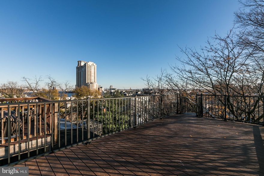 BEST VIEW in BALTIMORE!!!  SAVE THOUSANDS w/ APPROVED CHAP TAX CREDIT!  PERFECT FOR ENTERAINING! This stunning renovation has a chef's dream kitchen w/tons of cabinet space & breakfast bar. Separate dining & living areas. Spa like baths. Two fire places. Original Georgia Pine floors. Exposed brick. Upper & lower level w/d hook up.   Schedule your showing today!!!