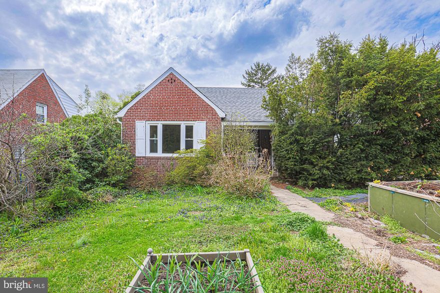 GREAT OPPORTUNITY for an investor to renovate and sell or homeowner to renovate and live in *
 4 Bedroom 1 FULL and 2 HALF Bath BRICK Cape Cod with COVERED Front Porch in Loch Hill * New architectural shingle roof * Brand new windows installed 4/17/25 * Hardwood floors * Multi car driveway * Great location * Needs work - use your imagination * Being sold "AS IS"!