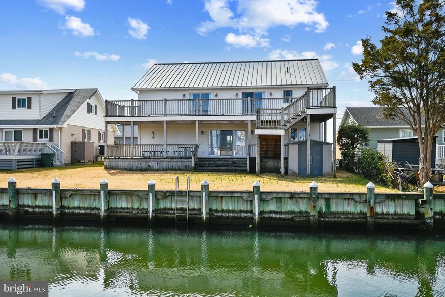 Welcome to 134 Old Landing Rd – A Stunning Bayfront Retreat! Experience waterfront living at its finest in this beautifully maintained bay waterfront single-family home, offered fully furnished and ready for immediate enjoyment. Perfectly positioned along the canal with direct bay access, this spacious home offers breathtaking water views and unforgettable sunsets from multiple outdoor spaces. Plus a front entry ramp provides easy access to the home, adding both convenience and accessibility.
The first floor features two comfortable bedrooms and a full bathroom, along with a convenient laundry area. The main living spaces include a bright kitchen, an inviting living room, and a second living area or a family room, ideal for gathering with family and friends after a day on the water. 
Upstairs, the second floor offers a spacious primary suite with a private bath, along with a versatile open  sitting area and a large walk-in closet. This level also includes three additional bedrooms and another full bathroom, providing plenty of room for guests and family.
Outdoor living is where this home truly shines. Enjoy front and rear second-floor balconies with sweeping views of the bay and canal, creating the perfect setting for relaxing and taking in Ocean City’s spectacular sunsets. The rear deck features a grilling area and flows seamlessly to a patio that leads directly to the canal, making it easy to enjoy boating, kayaking, or simply the peaceful waterfront atmosphere.
Whether you're looking for a primary residence, vacation retreat, or investment opportunity, 134 Old Landing Rd offers the ultimate coastal lifestyle with space, comfort, and incredible waterfront views.
Schedule your showing today!