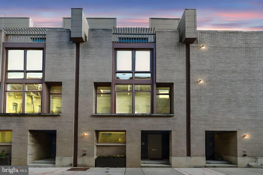 Welcome to 123 S. Van Pelt Street, a stunning 3-bedroom, 3.5-bathroom luxury townhome offering 3,441 square feet of elegant living space in the heart of RITTENHOUSE SQUARE. Located in the exclusive Van Pelt Mews, this home combines the convenience and vibrancy of Center City with the serenity of a quiet, gardened block. Designed by award-winning architect CECIL BAKER, this residence is a true masterpiece. Main Level: Oversized windows and soaring ceilings create a light-filled and open atmosphere. The chef’s kitchen, perfect for entertaining, features Wolf and SubZero appliances, custom cabinetry, and Quartz countertops with an elegant island design. Third Floor: Two spacious guest bedrooms, each with its own en-suite bathroom, and a laundry area for ultimate convenience. Fourth Floor: A private master suite featuring built-in storage, a custom walk-through closet, and a luxurious spa bathroom with marble finishes, and massive rainfall shower. The suite opens to a PRIVATE OUTDOOR BALCONY. Enjoy panoramic city views from the EXPANSIVE ROOFTOP TERRACE, perfect for relaxing or entertaining.  FULLY FINISHED BASEMENT for additional living or recreational space. A ONE CAR ATTACHED GARAGE is accessed via a SECURE GATED DRIVEWAY exclusively for Van Pelt Mew’s residents. Additional Amenities Include: Dual-zone heating and air conditioning for year-round comfort, Custom glass railings that enhance the sleek, modern aesthetic., ELEVATOR ACCESS to all four stories for seamless convenience., Beautifully crafted 3/4" solid wood flooring throughout. Located in the coveted GREENFIELD ELEMENTARY SCHOOL DISTRICT, offering top-rated educational opportunities. Walkable to Rittenhouse Square, the Schuylkill River Trail, and Philadelphia’s hottest restaurants, bars, and boutiques. Enjoy easy access to public transportation, including SEPTA and AMTRAK, as well as major routes 76, 95, and 676 for effortless connectivity. HOA fee of $2,400 annually for maintenance of the private driveway. Annual property taxes are available on the Philadelphia OPA website. Two years remaining on the original 10 YEAR TAX ABATEMENT for significant tax savings. Don't miss your opportunity to own this Cecil Baker-designed masterpiece. Schedule your private walkthrough today to experience the pinnacle of luxury living in Philadelphia.  Photos feature digital staging. Floorplan available upon request.