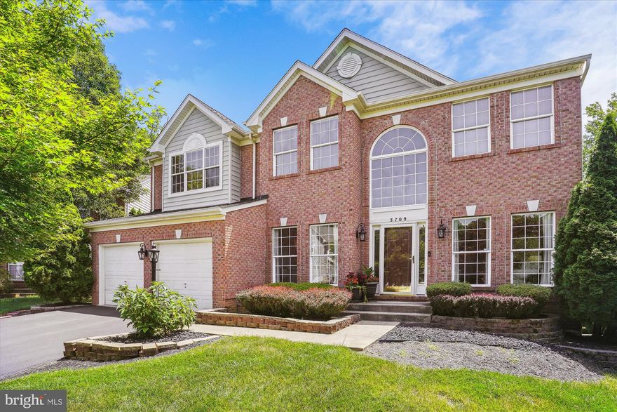 Exquisite 4 bedroom brick front colonial on a premium cul-de-sac lot. Two story entrance foyer, formal living room and separate dining room.  Over 4,300 SF of refined living space.  Elegant wood flooring and 9 foot ceilings on the main level.  Classic white kitchen with Corian counters, center island, gas cooking and a breakfast room with French doors that lead to a deck that overlooks wooded privacy.  Snuggle up beside the gas fireplace in the family room.  Work from home in the roomy main level home office.  Four generous size upper level bedrooms including a primary bedroom suite with an attached 2nd home office/sitting room.  Check out the huge walk-in closet in the primary bedroom suite and the owner’s bathroom with jetted soaking tub, separate shower and dual sink vanity.  Large walkout basement rec room plus a guest bedroom suite/bonus room with full bathroom.  Brand new HVAC system.  Convenient location close to Quantico and I-95