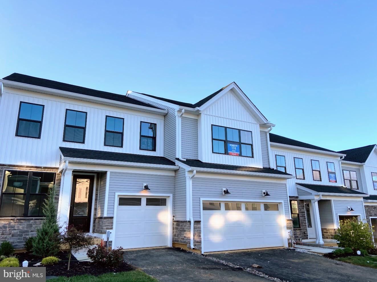 Fabulous newly constructed 3 bed/2.5 bath townhome, finished basement, ready for your move in!! This 2 car garage townhome boasts an impressive open floor plan with plenty of natural light throughout. The expansive great room is central to an expertly designed kitchen, equipped with ample counter and cabinet space, a sizable pantry, and a large island that's perfect for entertaining. The first floor also features a powder room and convenient everyday entry. Relax and unwind in the tranquil primary bedroom suite on the second floor, offering walk-in closets and a spacious primary bath with dual sinks and a luxe shower. Secondary bedrooms, with sizable closet, share a full hall bath. Bedroom-level laundry and plenty of additional storage are additional features. Anfield at Malvern is a master-planned new townhome community nestled in desirable Malvern, PA, Convenient to Route 202 and other major commuting routes, premium amenities including an outdoor pool, clubhouse, pickleball courts, walking trails, tot lot and dog park, all just minutes from shopping, dining, and top-ranked schools.