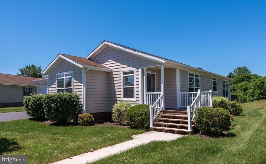 Well maintained home in 55+ Community of Pine Manor. This home boasts 2 bedrooms, 2 full baths and a spacious kitchen with ample storage. Attached one car garage includes a workshop area. Enjoy the rear deck with views of the North Mountain. Monthly lot rent is $574 which includes lawn maintenance, snow removal, sewer, water, trash and recretional facility.