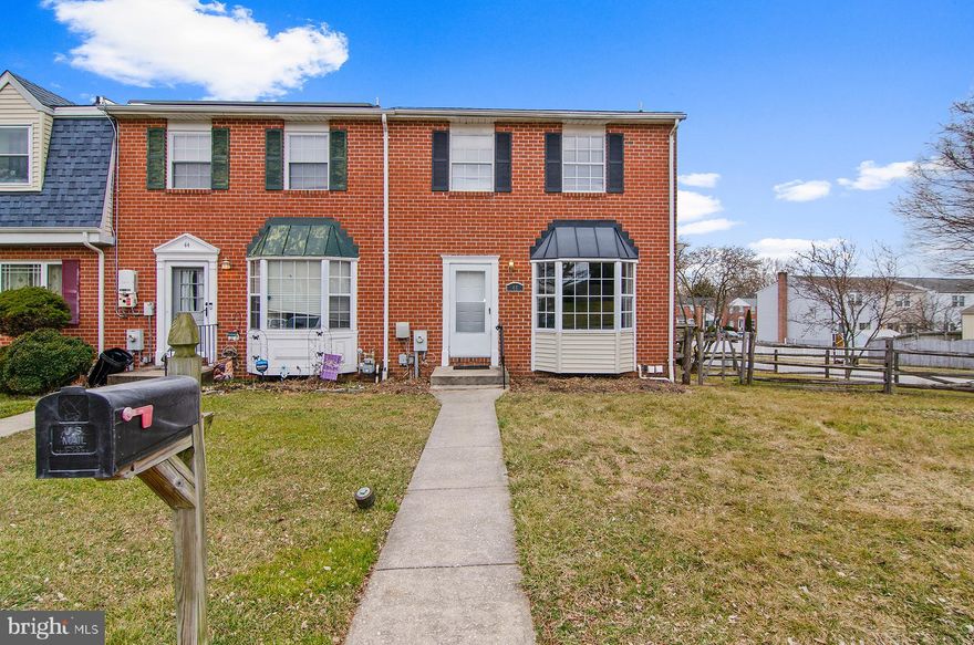 Great Opportunity to purchase one of the largest lots in the neighborhood. This Updated End of group Townhome has 3 Bedrooms, 2 Full Baths & 2 Half Baths, Walk out Basement, Huge multi level Deck, Fenced in yard, Plenty of parking, Bay window, Large eat in Kitchen and No HOA!