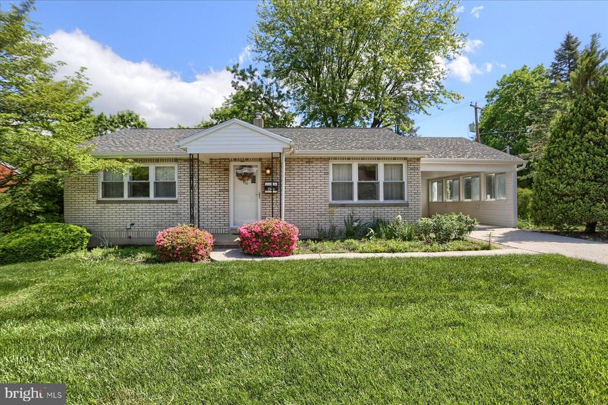 Cute-as-a-button rancher in Susquehanna Township!  Two bedrooms and one bath (with walk-in shower).  Small but mighty kitchen complete with double oven, large stainless steel refrigerator with bottom-load freezer, cooktop range, dishwasher, disposal, and built-in microwave.  Deep stainless steel sink with gooseneck faucet.  Solid surface countertops. Kitchen window looks out onto the beautiful back yard. An eat-in breakfast bar and a large pantry closet round out the kitchen and the flooring is an updated laminate plank which coordinates well with the abundance of cabinetry.  Enjoy the black corner cabinet at the basement's entryway, which will remain, for added storage of kitchen needs. The living room has two large windows which allow for natural light to shine through.  Owner used a portion of the living room as a dining area when hosting holiday meals. There are hardwood floors under the living room carpet and tile squares beneath the bedroom carpets.  As you proceed to the lower level, you will pleasantly discover a large bonus room with a bar and 4 bar stools included.  There are A LOT of built-in shelves and closets for storage. The unfinished portion of the basement is where the laundry is situated (newer washer and dryer included), and there is an additional refrigerator and chest freezer down there which also convey.  The other section of the unfinished basement space boasts built-in storage shelves - and the metal shelving remains, as well.  A Bilco door gives you access to the park-like setting of the back yard.  This home is a gardener's dream with perennial flower beds which come alive in the Spring and Summer.  Schedule a showing of your next home today!
