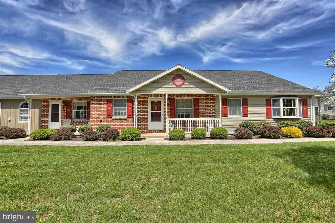 Relax & Enjoy 1 level low maintenance living at its finest! Located conveniently close to I-81, Shopping, & Carlisle Hospital, this Strawberry Court condo has been well maintained and includes spacious living room with lots of natural light, kitchen with cherry cabinets and dining area and sunroom! Property features two bedrooms with full baths and laundry room. Two car garage, great for storage! $149/mo fee for snow removal, lawn care and exterior maintenance.