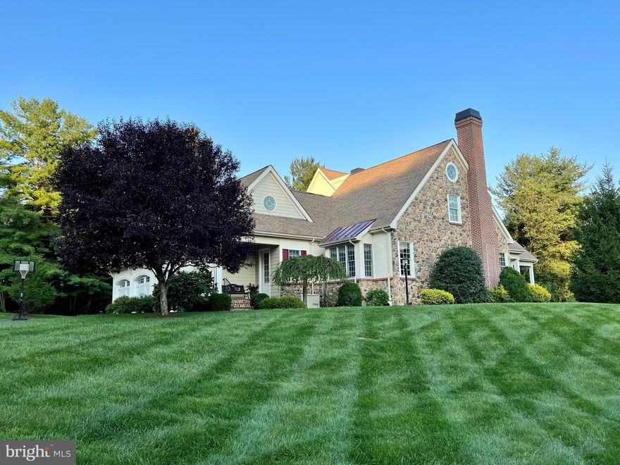 This is a one-of-a-kind master cabinet maker’s personal home! The expert craftsmanship & attention to detail is present in every aspect of this home! The hardscaped path leads you to the front of the home & as you approach, the stately herringbone brick chimney provides a brief glimpse that you are in for something special. The covered front porch gives way to the 2-story foyer with soaring vaulted ceilings. Beautiful oak hardwood floors extend in every direction & into the living room with expanded crown molding & cozy wood-burning fireplace with options to easily convert to gas. A custom archway leads to the dining room, boasting a high tray ceiling & custom built-ins with in-cabinet lighting. The kitchen is a cabinetmaker’s masterpiece, showcasing the craftsmanship in this home. The exquisite custom cabinetry & millwork—some is floor-to-ceiling— is adorned with in- and under-cabinet lighting. Gently curved counters & cabinets gently guide you to the butler area, with separate sink. Glistening granite countertops extend throughout the entire kitchen & onto the large sit-at island. The counters are perfectly complemented by a beautiful tile backsplash with an intricate mosaic behind the stainless-steel six-burner built-in range. This kitchen is simply breathtaking! The adjoining breakfast nook features recessed lighting and 12-foot sliders to the rear hardscaped patio area. The family room features a soaring stone accent wall that includes a gas fireplace & built-in cupboards. The coffered ceiling offers perfectly-placed recessed lighting, complemented by an abundance of natural light provided by the massive 16-foot Andersen barn-door style sliders, providing easy access to the large maintenance-free deck, where you will enjoy mature landscaping and plentiful wildlife! The 1st-floor laundry features tile flooring & more custom cabinetry, while the mud room offers a convenient secondary entrance, both featuring exceptional cabinetry & trim. The 1st-floor master suite includes a large tray ceiling, recessed lighting, and brand new carpeting. French doors lead to a private covered balcony, perfect for your morning coffee & relaxation! His-and-her walk-in closets with custom organizers ensure no shortage of storage options! The large tile bath boasts double vanities, large jacuzzi tub & oversized tile shower. Upstairs, the Princess Suite boasts -4- closets as well as a full tile bath with more custom built-ins, while the “Prince Suite” highlights a soaring cathedral ceiling, large closet, & full tile bath that is shared with the hallway.French doors lead to a 2nd-floor study with custom built-in bookshelves & alcove that is perfect for a desk to overlook the lush rear yard. Nicknamed “the 2nd-floor apartment”, a large bedroom suite features a sitting area, full tile bath, and includes its own entrance. A separate thermostat offers comfort & efficiency. The full finished basement is sprawling, with a gorgeous built-in desk area & custom shelving. French doors lead to the large in-law suite/lower-level apartment, providing a living room & dining area that adjoins the kitchenette. An adjacent large bedroom offers convenient access to the full tile bath & laundry area. The suite features a hardscaped patio to the rear, along with a garden area. Outside, you’ll find a phenomenal drive-under deck storage area that is perfect for your boat, RV, or lawn maintenance equipment! This home is energy efficient and economical to own with the efficient 4-zone HVAC system and premium Andersen windows throughout the home. The oversized 3-car garage provides plenty of additional storage & the brand new 25kW Generac whole-house generator provides peace of mind. The location is perfect:  Take advantage of this 2+ acre oasis situated in a small enclave of homes right outside of historic Marshalton—off the beaten path, yet just minutes to West Chester! Take advantage of the award-winning Downingotwn School District and STEM academy