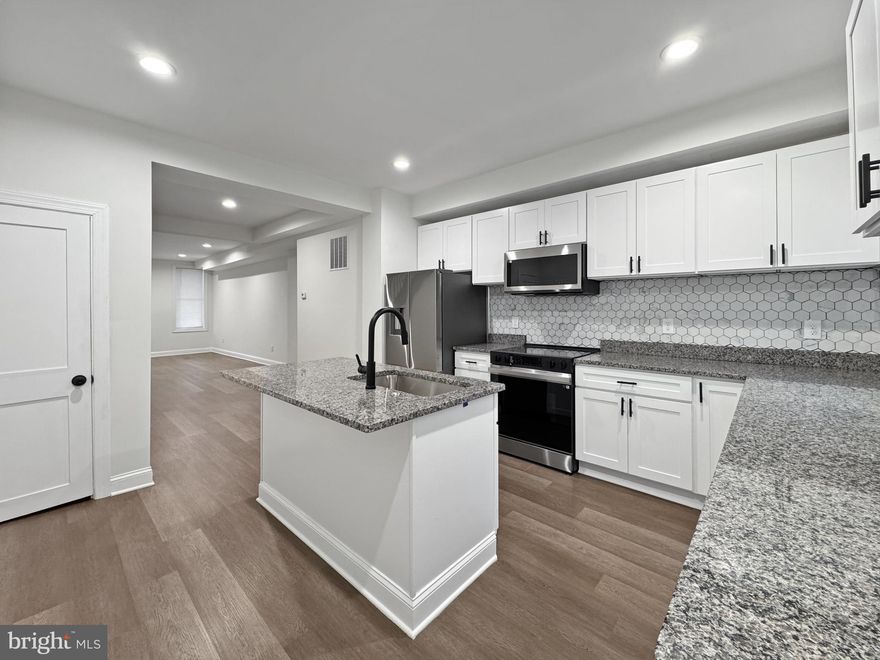 Welcome to your dream home! This impressive residence boasts beautiful LVP flooring throughout the main level, offering a sleek and durable space that’s perfect for modern living. The airy layout is enhanced by recessed lighting, creating a warm and inviting atmosphere.

At the heart of the home is the fully updated kitchen, featuring elegant granite countertops, stainless steel appliances, a spacious pantry, and a stylish island that’s perfect for casual dining or entertaining guests. This kitchen is truly a chef’s delight!

As you head upstairs, you’ll find brand-new carpet throughout, providing comfort and elegance. The fully updated bathroom offers a contemporary design and finishes. The owner’s suite is a true retreat, complete with a private bathroom for added convenience and privacy.

This home combines style, functionality, and comfort, making it the perfect place to create lasting memories. This one is just minutes from Camden Yards and M&T Bank Stadium. Don’t miss out on this incredible opportunity—schedule your showing today!