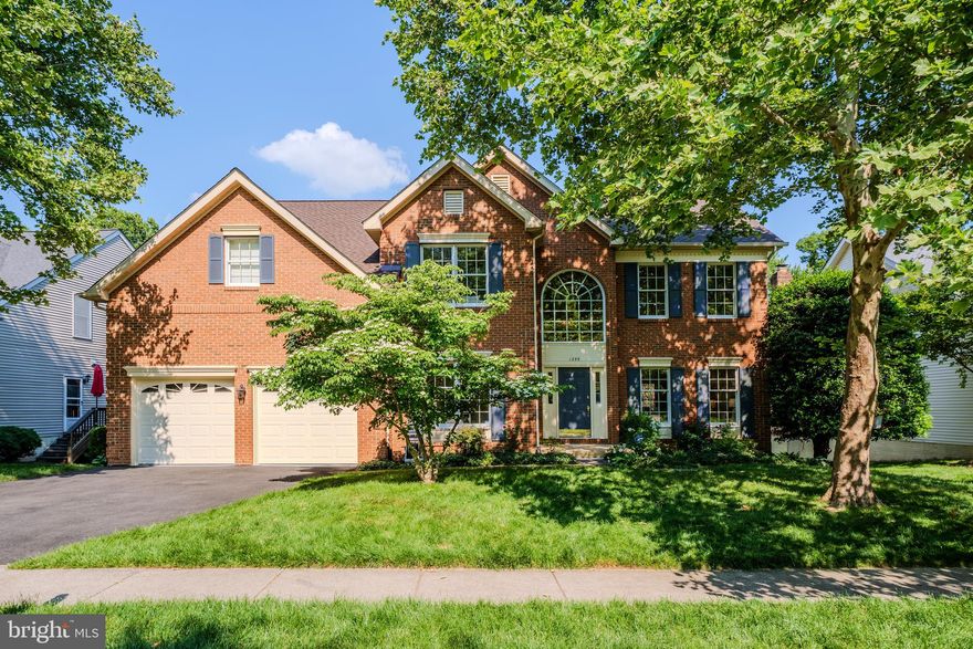 A brand-new roof was just installed on this beautifully maintained Toll Brothers colonial, perfectly situated on one of the most desirable lots in Great Falls Crossing. Lovingly cared for by the original owners and lightly lived in, this exceptional home offers timeless elegance, peaceful wooded views, and over 3,500 square feet of refined living space above grade.

Tucked away at the top of the neighborhood on a quiet cul-de-sac, the home backs to a serene tree buffer, creating a private and tranquil setting rarely found in Reston.

A grand two-story foyer welcomes you inside, where classic architecture and spacious rooms create an inviting atmosphere throughout. The main level features elegant formal living and dining rooms with extensive moldings, a private home office, and the coveted sunroom filled with natural light. Just off the sunroom is a large deck overlooking the peaceful wooded backdrop—perfect for outdoor dining, entertaining, or simply relaxing in the quiet setting. The spacious kitchen opens seamlessly to the extended family room, creating the ideal flow for everyday living and entertaining. Dual staircases add functionality.

Upstairs, all bedrooms feature direct bathroom access, including a private en-suite and a Jack-and-Jill layout. The spacious primary suite is a true retreat with a sitting area overlooking tranquil wooded views, a large walk-in closet, and an expansive primary bath with soaking tub and glass shower.

The walkout lower level is filled with natural light from a full row of windows and is already rough-in plumbed, offering endless possibilities for future expansion—whether you envision a recreation room, gym, guest suite, theater, or all of the above.
Located in the sought-after Great Falls Crossing community, residents enjoy walking trails, a community pool, tennis and pickleball courts, basketball court, and two newly updated tot lots. The location is truly exceptional—within 15 minutes of both Tysons Corner and Dulles Airport, approximately 2.3 miles to Metro, and just minutes or even walking distance to Lake Fairfax Park and the beloved Lake Anne Farmers Market. OPEN HOUSES: SAT, 05/23, 2:00 - 4:00 PM & SUN, 05/24, 12:00 - 2:00 PM SHOWINGS START 5/21