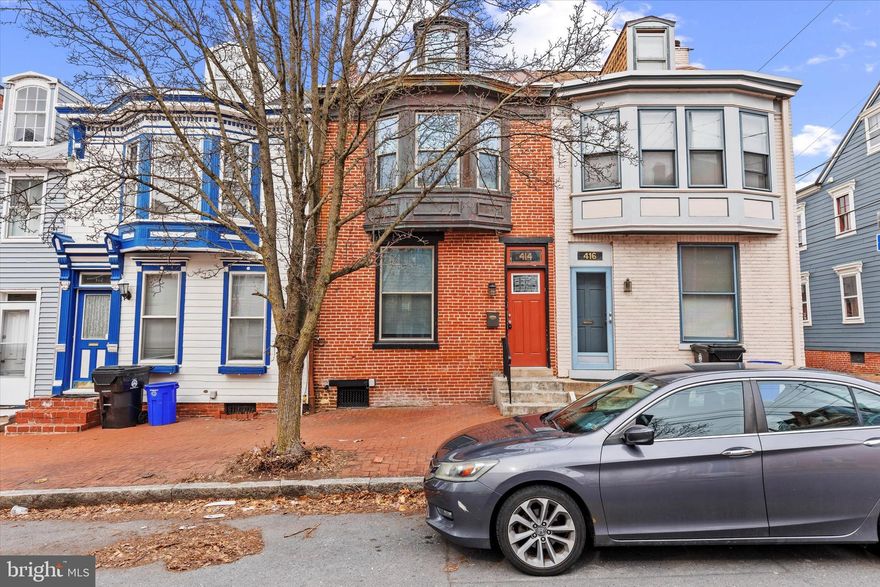 Welcome to 414 Boas Street, a beautifully renovated gem located in the desirable Fox Ridge neighborhood! This charming abode boasts a perfect blend of modern updates and classic character—with 3 bedrooms including a spacious primary room with a custom walk-in closet, 1/2 bath on the first floor and large full bath on the second floor, gorgeous exposed brick walls throughout the home, granite countertops and stainless steel appliances in the updated kitchen, washer and dryer and utility sink area, large 3rd bedroom on the 3rd floor with plenty of room to relax or create your own retreat, central air, and an enclosed backyard with a large patio, ideal for outdoor gatherings. This home is just a short walk to the State Capitol, the vibrant Midtown area’s bars and restaurants, the Broad Street Market, and the beautiful Susquehanna River walk. Don't miss out on this opportunity to own a fully remodeled, move-in ready home in the heart of it all--complete with  two  large off street parking spots!