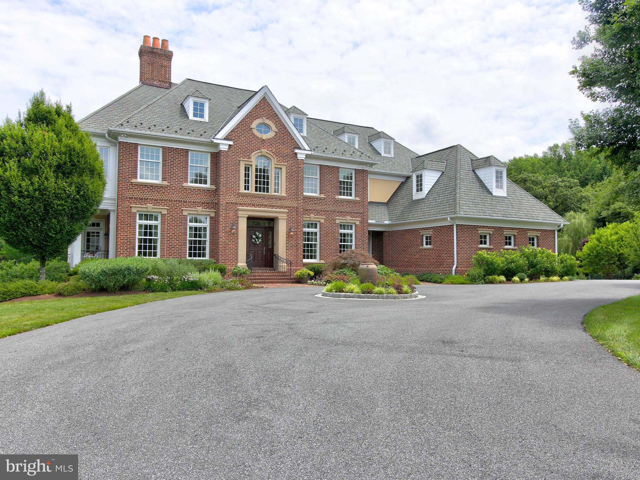 Welcome the Main Line of Delaware County & to an almost 7,500 squ ft of magnificent elegance on 5 acres. This property was custom built by a builder for himself, so no expense was spared. The best of the best was used in all construction inside and outside. The professional landscaping will capture your heart from the moment you pull up the driveway to the 2 story brick colonial. Enter into a grand foyer with hardwood floors & a spectacular curved staircase that any bride would die for on her special day. The formal living room invites you in with a gas fire place, multi stage moldings, almost floor to ceilings windows and French doors to a side covered porch. The dining room has inlaid hardwood floors, custom moldings both ceiling and chair height and exquisite lighting. There is a first floor office that could double as an in-law quarters with a 2nd powder room near by that shares a hallway with a bonus room/storage with sink, large closet & a door to another side porch that would be a private entrance if the in-law was being used. There is a Butler's Pantry with a sink, 42" cabinets and granite counter tops that connects the dining room to the gourmet kitchen with all the amenities you would expect. The 2 tiered island in the kitchen is the center stage of the room that is the heart beat of every home. The outstanding features are granite counters, ceramic back splash, ceramic floors, large range hood, double ovens, built in microwave, stainless steel sink with side vegetable sink, arched doorways & side desk area. This space all spills over into a large breakfast room with windows all around allowing for Mother Nature to be part of the d cor and making the space a cheery place to start your day. The atrium doors lead to the elevated flagstone terrace & the outside kitchen with built in grill where cocktails & relaxed dining can be enjoyed at the end of your day. Moving back inside Family room with vaulted ceilings & lots of high hat lights will provide the finishing touches to your day while putting your feet up and enjoying a fire in the gas fire place and watching a movie. It also has atrium doors to a patio that wraps around to the driveway. Let's use the back stairs to ascend to the 2nd floor bedroom wing where there are 4 spacious bedrooms are ALL having access to a full ceramic bath and all having walk-in closets. The kids will not have to argue over who gets the room with a bath. The true princess suite will still be up for grabs and consist of larger walk-in closet and larger full private bath. The laundry room shares the hall with the bedrooms for easy access and has cabinets, folding area and laundry sink. Also, there is a true walk-up 30 floor that could easily be finished off. A large landing with hardwood floors from the front staircase separates the master from the other bedrooms. The grand master suite will exceed your expectations and make you feel like Royalty. You will be welcomed in through double doors into a spectacular room accented by a coffered lighted ceiling that creates a relaxing southing ambiance. There are 2 walk-in closets to accommodate any size wardrobe. The master bath was just remodel and is gorgeous with double vanities, walk-in shower, ceramic title & whirlpool tub with windows all around. The finished basement is unbelievable with custom wet bar with beer cooler, dishwasher and pendent lights, a game area, an exercise room that could be a 64 bedroom or in-law area, kids area, 2+4 family room, full bathroom in basement with a sauna, 3 storage rooms and an outside exit to lower level patio. A few other features are; central vacuum system, radiant heat in basement, house-wide, centrally managed, wireless internet system and house is wired for a generator, 10' ceilings, 8" baseboards, lots of ceiling fans, lots of special lighting, surround sound, shed The location gives quick easy access to Center City's attractions, Philly Intern Airport, Routs 1476, 195, Rt 3 & 202 to Wilmington.