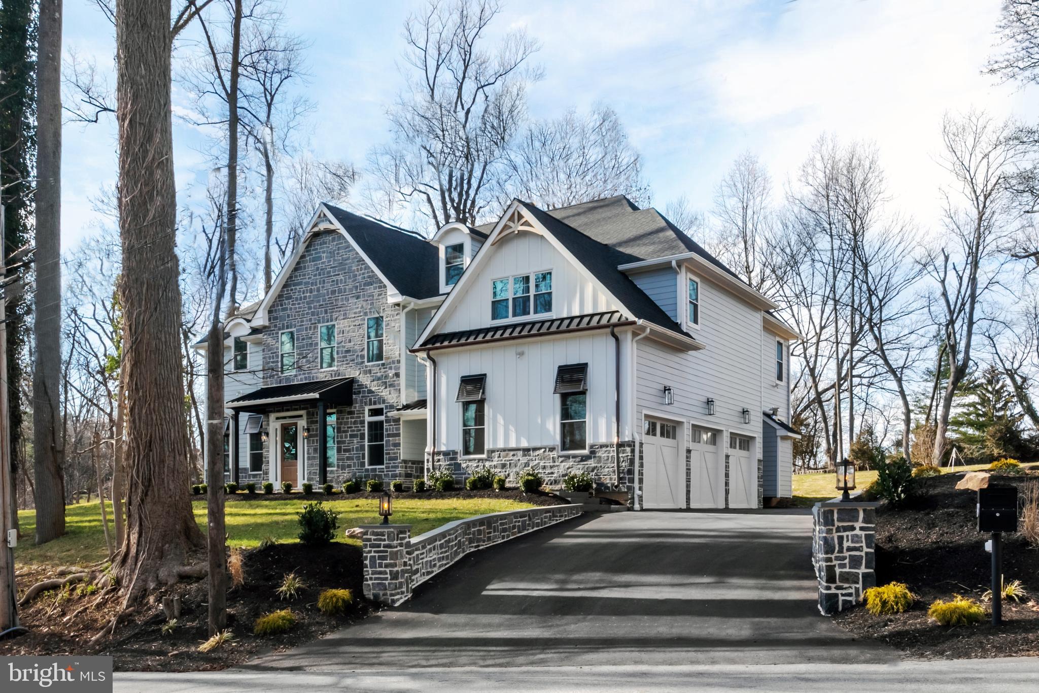 Sitting atop a gently sloped hill enter the privacy of your newly-constructed 5BR/5Bath Colonial home thru the stone pillars up the driveway into your 3-car attached garage OR up a few steps along the shrubbed flagstone path which leads to an alternative Secondary Entrance on a snowy or rainy day to keep your main entrance sparkling, or your Main Entry. The custom exterior includes decorative batt and Board Hardie Plank and stone façade accented by the special touches of the stylized Aluminum Bahama Shutters & wood gable ties with a touch of copper gutters.
You will feel like you have “arrived” once you open your extraordinary 48” Front Entry Door w/sidelights and transom. Upon entering pure delight awaits you. A large Entry Hall includes a sleek modern, turned iron railing and complimentary metal and bulb chandelier plus 2-piece crown detailing. To the left is Living Room with custom wood accent wall. (This room can also be enclosed for use as a study—Upgrade.) To your right is a separate Formal Dining Room opening into Kitchen thru perfectly situated separate Wet Bar area. Your eyes will pop when your field of vision focuses on the spectacular Gourmet Kitchen w/Custom Banquet Seating, Kraftmade cabinetry w/ recessed style shaker panel doors, GE Café SS appliances, including a 48” 6-burner dual fuel range, side-by-side refrigerator and under counter microwave, Island w/Quartz Countertops and French Doors to Private Flagstone Patio. Opening to the sunlight Family Room w/Coffered Ceiling and Gas FP w/custom Beam Mantle provides optimum entertainment space for gatherings both large or small. Your secondary Front Entry includes Cubbies, Powder Room w/decorative 3-dimensional wall tile, double closets and Outside Entry in from 3-Car Garage. The BEST is saved for LAST – You asked for it and this Builder heard you … A commodious 1st Floor In-law or Special Person Suite w/Custom Closet and Full tiled ceramic Bath! This entire custom home is covered with Brushed White Oak flooring (with the exception of secondary Bedrooms), and 4” Recessed lighting throughout.
Ascend the Stairway (either through the primary or secondary staircase) to the spectacular 2nd floor. The large open area includes a magnificent custom Wall Unit – gather family around w/comfy seating and utilize as Second Family Room. The Master Bedroom Suite retreat (which also includes custom wood accent wall) is SO large you have varied layout choices for this beautiful, bright, private living space in which to de-stress. Custom fitted His and Hers Closets leads to a sumptuous, relaxing spa-like Master Bath, with Double Sinks, oversized Tiled Shower. Private water closet and a semi-separate space to relax in the 64" Free Standing Square Tub w/top of the line chrome Moen tub-filler faucet. Secondary bedrooms include a Prince/Princess Bedroom suite and 2 Additional Bedrooms connected by a Jack N Jill bath, a Full Laundry Room and Linen Closet complete the 2nd floor.
The additional partially daylight, fully Finished Lower Level with Full Bath and Outside Entry allows for a myriad of layouts – Movie Theater, Private Office, Game Room, separate Nanny space … whatever fits your family needs can be accommodated (Upgrade.)
Situated on a 1-Acre lot perfect for outdoor fun and frolic conveniently located in the T/E top-rated school district … what more could you want! In either a newly constructed or renovated/redesigned Galdamez-built home you’ll always find perfection in many sizes because it’s the little things that matter!!