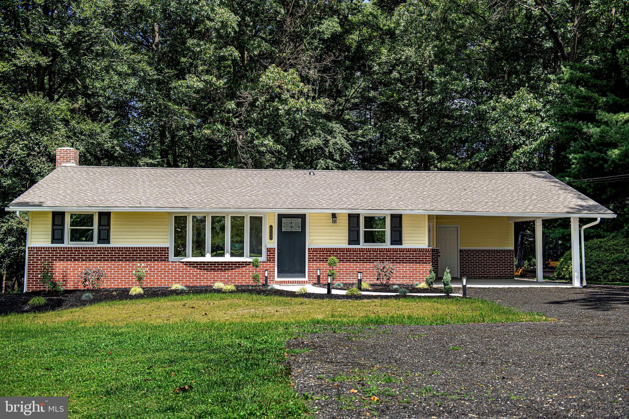 Enjoy one level living in this Tastefully Renovated Rancher on a level picturesque one acre lot that backs to the woods in rural Dublin with Natural Gas Heat. You will marvel at the Quartz countertops in the kitchen along with the custom cabinetry, new stainless steel appliances, luxury wide plank vinyl flooring. The entire house is bright and light with gleaming refinished oak hardwood floors in the living room, hallway and bedrooms. Ceiling lights in all the bedrooms brighten up those rooms as well! The laundry room is conveniently located on the main level next to the bathroom and just down the hall from the bedrooms. Doors open to the bathroom from the laundry room and the adjoining bedroom. The sparkling unfinished basement is waiting for your ideas, could be finished out for more family members as you have a separate outside access. The 20 x 16 carport with a new concrete floor, new columns and a new maintenance free ceiling can also be your covered patio for entertaining. A 16 x 8 shed at the rear of the carport and a 28 x 12 detached shed with electric and new roof is available for your workshop or just for storage. The driveway has a four car parking area in front of the house and more parking on the side and rear of the home for larger vehicles. New roof, new kitchen, new bathroom, new lighting, the list goes on. No HOA.