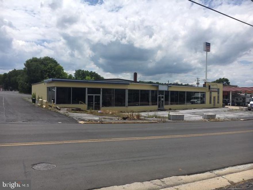 Interstate I-81, Exit #264, Historic New Market! 1.45 acres of land for commercial redevelopment to be used as C-stores, hotel, restaurants, medical or other commercial uses. Use the existing 11,366 Sq. Ft. for repurposing for many business opportunities. Large showroom with warehouse for storage along with plenty of on-site parking along with municipal parking on the east edge of the property. Excellent road frontage, property is located between two lighted intersections for maximum visual impact along the highly trafficked tourist route to the Shenandoah River excursions, Shenvalee Golf Resort, Luray Caverns, Shenandoah Caverns, Civil War Museum and other tourist attractions. Join local neighbors such as Quality Inn, John Henry General Store, McDonald's, Subway, Dunkin Donuts, Liberty and Shell C-stores. Come to the Shenandoah Valley for the Opportunity, stay for the Hospitality!