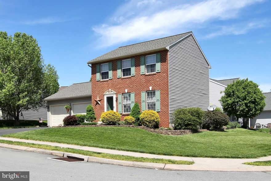 Move-in ready home with so many recent updates, including laminate flooring, fresh paint, newer stainless kitchen appliances and light fixtures.  New roof, patio door, AC and water heater.  Finished basement with gas fireplace and lovely brick patio off large eat-in kitchen. 2-car garage with additional storage. Great corner lot. All appliances included.