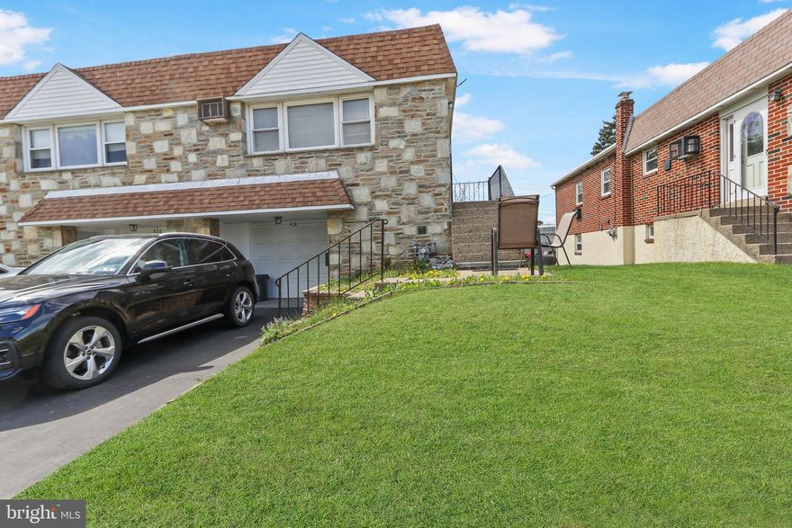 Situated in one of Lansdale’s most desirable neighborhoods, this twin home offers a great opportunity to add your personal touch. The formal living room is filled with natural light from a large front window, highlighting the hardwood floors and creating a warm, welcoming space for everyday living and entertaining. Just a few steps up, the bright dining room flows easily into an oversized kitchen—larger than many in the area—featuring abundant cabinet and counter space, a replaced sun-filled window, and room for a full-size table, perfect for casual meals.
The main level includes three bedrooms, all with hardwood flooring, generous closet space, and thoughtful updates, along with a full hall bath featuring a replaced shower surround and an additional large hallway closet for storage.
The lower level adds valuable living space with a spacious fourth bedroom, full bath, mudroom/utility area, under-stair storage, and a garage with an electric door opener. The impressive 19x18 family room offers a versatile layout, complete with a gas fireplace, plenty of storage, and direct access to the backyard ideal for entertaining, play, or relaxing outdoors.