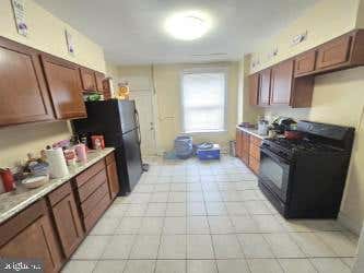 Photo of 637 E 29th Street, BALTIMORE, MD 21218 (MLS # MDBA2220820)