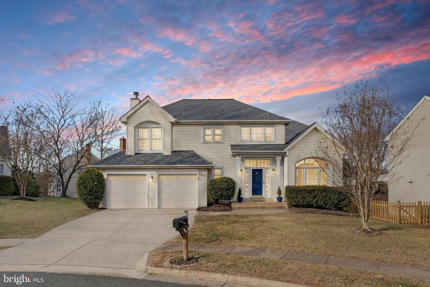 Tucked away on a quiet cul-de-sac in Ashburn Village, this delightful colonial checks all the boxes: location, charm, and thoughtful updates while keeping a little whimsy in its step. Located close to the Pavilion and just minutes to Ashburn Village shopping and amenities, and super close to Ashburn Elementary, this is community living at its best.

Step inside the two-story foyer, freshly updated with a new light fixture, and be welcomed by the warmth of hardwood floors that continue into the living room, dining room, and family room. To the left, a practical and stylish mudroom/laundry area with brand-new LVT flooring offers garage access and space to stash sports equipment out of sight.

The heart of the home is the fully renovated kitchen (2017), featuring updated cabinetry, granite countertops, a natural stone backsplash, under-cabinet lighting, two pantries, and a full suite of Samsung stainless steel smart appliances (3 years old or less), including a gas range. New LVT flooring continues through the kitchen and eat-in area, making it as functional as it is inviting.

Just beyond, the family room is full of charm with hardwood floors, recessed lighting, and a cozy gas fireplace. Newer windows and doors to the deck (2021) flood the space with natural light and lead outside to a Trex deck (2020) and a fenced backyard for outdoor enjoyment.

Upstairs, hardwoods continue through the landing and hall. The primary suite is a true retreat with a tray ceiling, ceiling fan, walk-in closet, and a beautifully updated bath featuring a soaking tub, a refreshed shower with a bench seat, and decorative ceramic tile flooring. Three additional bedrooms with plush carpeting share a renovated hall bath in crisp grays and whites, complete with ceramic floors, a new vanity, lighting, and mirrors.

The finished walk-up basement adds even more flexibility with a recreation area, a full bathroom, a guest bedroom/bonus room, and multiple storage rooms, one complete with a workbench. Walk-up access leads directly to the backyard. The roof was replaced in 2018, the AC was replaced in 2022, and the water heater was just replaced in 2026 for added peace of mind. With an abundance of updates and fresh paint throughout, this home is truly move-in ready. 

A two-car garage with excellent storage, driveway parking, and plenty of street parking make hosting easy. With scenic lakeside jogging paths down the street, multiple pools, sports pavilion, pickleball and tennis courts, and quick access to commuter routes and the Metro just four miles away, this Ashburn Village gem truly feels like home.