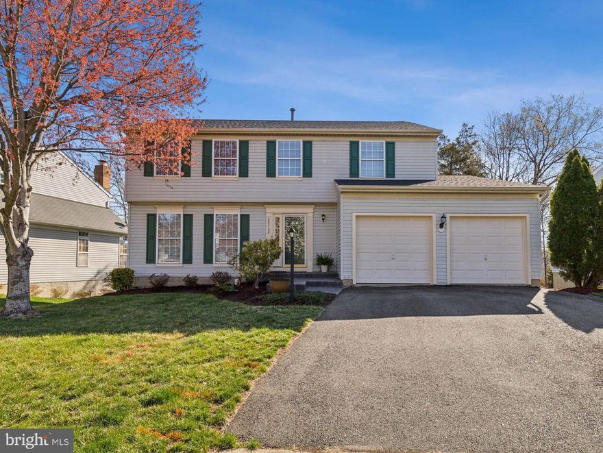 Located in the heart of Ashburn - 20752 Cross Timber is the perfect home for you! Within walking distance of schools, shops, restaurants and the W&OD Trail and located in the sought after Belmont Ridge II neighborhood with low HOA fees. This one-owner home spans three levels and sits on a nicely landscaped, fenced rear lot. The main and upper levels of the home have been updated with LVP floors & modern lighting.  Ample space to entertain inside and out! Updated kitchen has many upgrades including island, granite countertops, pendant lights, new plumbing fixtures, painted cabinets. newer stainless steel appliances and gas cooking. Cozy up to the gas fireplace in the family room. The light and bright formal dining room with bay window  and living room include LVP and crown molding. The upper level offers four spacious bedrooms. The primary bedroom has large walk-in closet.  The en suite primary bathroom with  double vanity and tiled walk-in shower was updated in 2024. Finished walk-out lower level offers a rec room and den with newer carpet and full  bath rough-in. Are you ready for warmer weather? Then plan to enjoy your Summer entertaining on your large screened porch with ceiling fan and speaker system. There is also uncovered deck space for grilling, a paver patio for those nights enjoying a fire pit and fenced rear yard. Under deck storage space too! Updates include: lighting, plumbing, LVP floors,  2 year old carpet, roof is about 7 years old, fence installed in 2023, new garage door opener (2025), gas stove & microwave installed 2023, refrigerator & dishwasher installed December of 2024.  Close to Loudoun's wineries/breweries/farms and easy access to Dulles Airport, Dulles Toll Road and Greenway and short drive to Silver Line Metro.