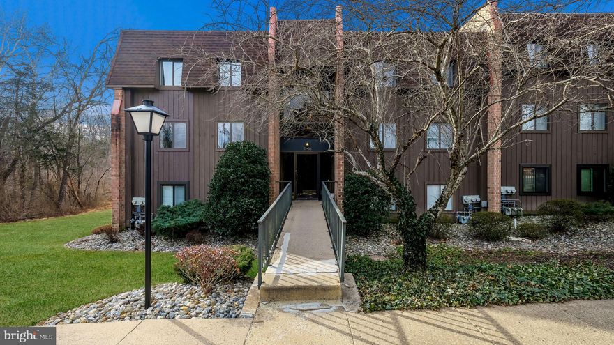 Freshly updated one bedroom, one bath home in the vibrant New Hope community of Hermitage. Coveted  location and turnkey condition offer an attractive opportunity in the New Year! Step into the open plan living space framed by dramatic floor-to-ceiling windows and sliding glass doors. The recently refreshed home offers newly painted walls and luxury plank flooring installed throughout. The tastefully remodeled kitchen with butcher block countertops and subtle grey cabinets seamlessly connecting to an adjacent dining area, perfect for casual meals or entertaining guests. Unwind in the oversized bedroom, a serene retreat with direct access to a full-ensuite bathroom equipped with a full-size washer and dryer. The spacious living room extends to a large balcony, ideal for outdoor entertaining, and overlooks the 48-acre Aquetong Spring Park, home to walking trails and waterfalls. Additional entertainment and recreation exist at the Hermitage Association swimming pool.  Outstanding opportunity for home ownership or investment, the long rental history allows for continued use. Located minutes from the iconic towns of New Hope and Doylestown, known for their shops, restaurants, and museums.