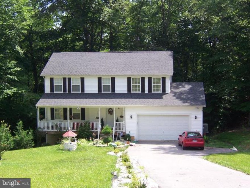 This is a great home with lots of room plus a full basement unfinished w/ 3 piece rough in for a full bath,  The house backs to woods  and the neighbors have lake frontage.  Total 3,519 square foot of living space can be yours.  The owner is making some repairs and doing a deep clean along with paint and carpets shampooed.  Don't miss this huge beautiful home and community.