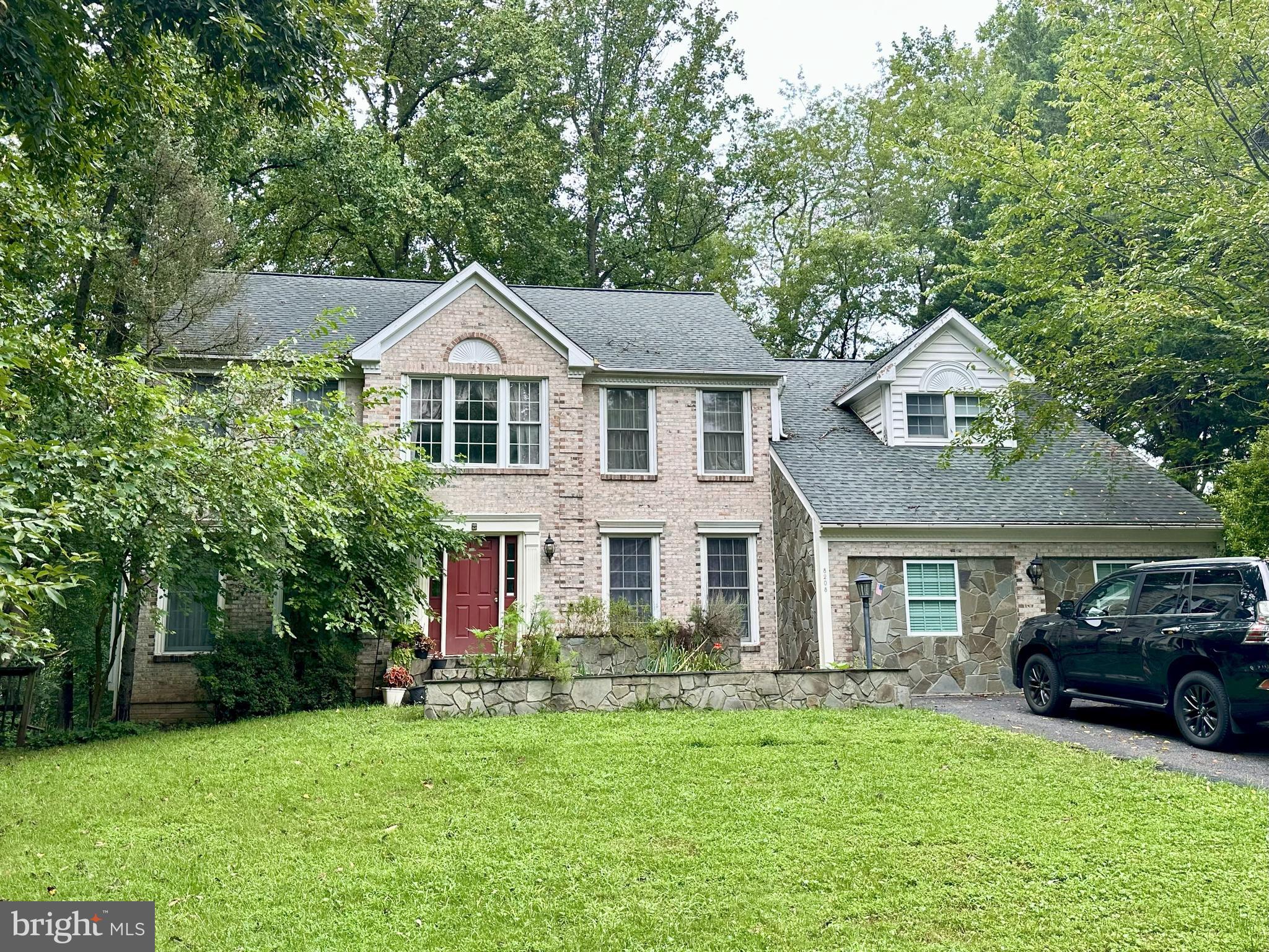 Spacious Colonial with two story foyer, large kitchen and family room with skylights and sliding doors to oversized deck. garage converted to two bedrooms and full bath, office with French doors. Large master bedroom with vaulted ceilings, super bath with jacuzzi tub, dual sinks. Finished lower level with wet bar, entertaining space with shelves and built ins, full bath and guest bedroom, walkout to rear yard. Larger than most models in the same subdivision, some updating and TLC needed to make it shine. Sellers may need some rent back.