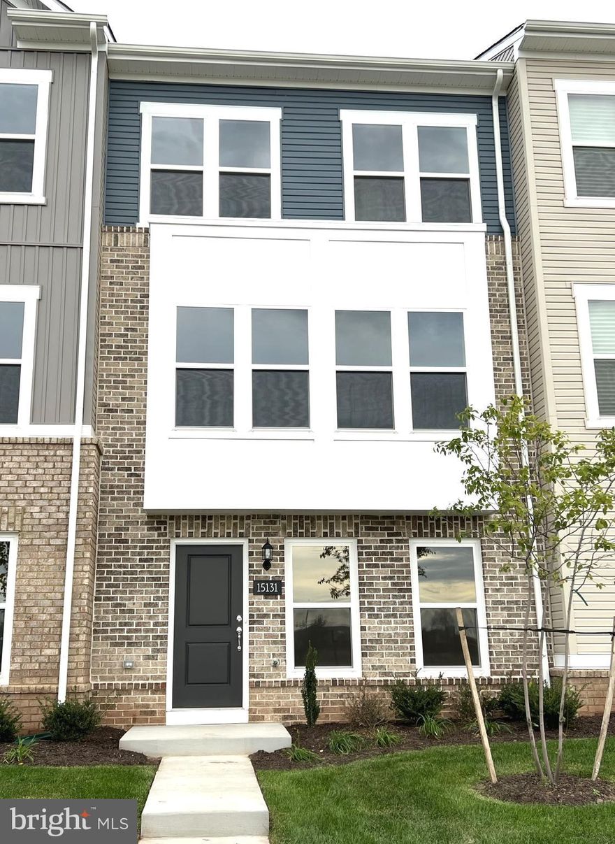 Be the First to Live in this Newly Built Home Located in the Heart of the Historic Town of Haymarket!  This Townhome boasts 3 Bedrooms, 2 Full Baths, and 2 Half Baths, and has a Contemporary Open Floor Plan that shines with Natural Light throughout the Home.  The Entry Level Welcomes you with a Bonus Room that can be an additional Family Space, Office, or Extra Bedroom.  The Gourmet Kitchen on the Main Level boasts a huge Kitchen Island, great for Entertaining and Family Gatherings, along with beautiful Quartz Countertops, an Oversized Pantry, and access to the back Deck.  The Living Area has extra space with an additional 2 feet bump-out, and a view of the Bull Run Mountains.  The Primary Bedroom on the Upper Level, has 2 Walk-in Closets, and a stunning Primary Bathroom with Frameless Spa Shower.  There are 2 additional Bedrooms on the Upper Level, a Hall Full Bath, and Laundry Area.  Custom Designer Linen Levolor Cellular Shades are being installed.  This home is conveniently located steps from Restaurants, Shops, and Groceries, along with having easy access to I66, Rt. 15, Rt. 29, and other major roadways.  A Must See!