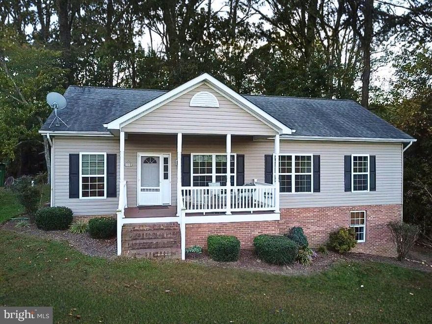 Discover this spacious Mechanicsville home set on 1.6 acres of flat, open land—perfect for those seeking room to spread out and enjoy a peaceful setting. The main level features three comfortable bedrooms and two full bathrooms, while the lower level includes a large living area, a full bath, and two bonus rooms with closets offering flexible space for an office, gym, or hobby area. Outside, you’ll find a barn with electricity, ideal for storage, a workshop, or creative projects. No HOA and conveniently located near Routes 5 and 235, this property combines tranquility with accessibility. A wonderful opportunity to make this home your own!