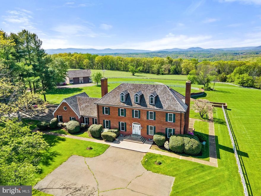 Price Reduced. Seller Motivated. Welcome to Clearview Farm a classic country estate consisting of over 40 acres, a place with unimaginable views in a tranquil private setting, yet just minutes to the Town of Warrenton. Large 4 level brick colonial situated on over 40 acres with barn, center aisle stable, and large detached garage/shop. Recent updates to kitchen, bathrooms, hardwood flooring, marble flooring, and new paint throughout. 3 wood burning fireplaces, large basement and loft. Flagstone rear porch that overlooks numerous open pastures with one of a kind mountain views. Shown by appointment only. All outbuildings sold as is.