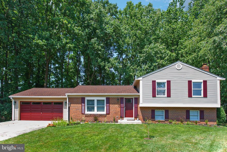 Welcome to this stunning 4 bedroom, 3 bathroom split level home located in the desirable community of Bowie, Maryland in the Belair Greens neighborhood. As you enter the home, you are greeted by a spacious living room with large windows that allow for plenty of natural light to flow through. The kitchen boasts granite countertops, stainless steel appliances, and a wonderful backyard porch area to enjoy coffee on.

The upper level of the home features a primary suite with a private bathroom. The property boasts three additional bedrooms and a full bathroom. The lower level of the home includes a room perfect for entertaining with a cozy fireplace, a full bathroom, laundry room, and the downstairs bedroom with a door accessible to the rear yard.

The backyard is perfect for entertaining, with a deck and plenty of space for outdoor activities. There is also a two-car garage, providing plenty of storage space for all of your vehicles and gear.

This home is located in a convenient location to Maryland Route 197, with easy access to shopping, dining, and major roadways. Don't miss the opportunity to make this beautiful split level home your own.