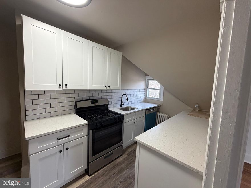 Spacious 2 bedroom, 1 bathroom apartment located on the 3rd floor of 75 W La Crosse Ave in Lansdowne. This well-maintained unit features a brand new kitchen, very large bedrooms and a comfortable layout with plenty of natural light throughout. Shared washer and dryer are available in the basement for tenant use. Outdoor spaces include a welcoming front porch and a rear yard for tenant enjoyment. A private driveway provides off-street parking. Utilities are INCLUDED. No pets and no smoking permitted. Conveniently located near public transportation, shopping, dining, and local amenities. First month & security deposit required upfront