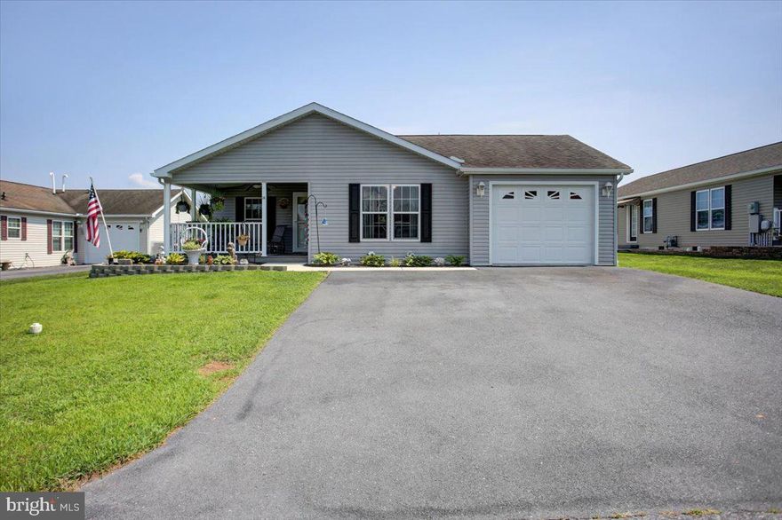 Welcome to this beautifully maintained, low-maintenance, one-level home located in a desirable 55+ community. This charming residence offers a host of additional features, including a bright sunroom and a lovely covered porch, perfect for relaxing or entertaining. An open layout allows for an abundance of natural light and a sense of spaciousness. New LVP flooring and real hardwood flooring give this home a bump in quality. Conveniently located close to shopping, I81 and a mini casino! An oversized attached 1 car garage provides housing for your vehicle and or space for a hobby. A shed for added storage, privacy fence and a small vegetable garden also convey with the property.  
Situated on a rented lot, the monthly fee of $300 covers lot rent, sewer, and trash service. For added convenience, you can opt for lawn care and snow removal for just $50 more per month.
Don’t miss your chance to enjoy easy, carefree living in this delightful home!