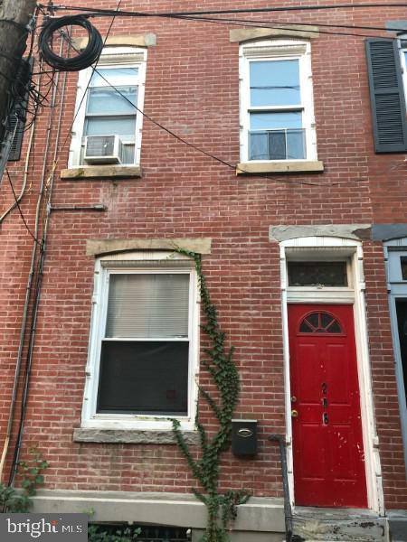 Welcome to 208 W George Street, a charming 3-bedroom, 2-bath brick-front townhome nestled in the heart of Northern Liberties. This well-maintained property offers a warm and inviting layout with hardwood floors throughout and plenty of natural light. The main level features a spacious living and dining area that flows into an updated kitchen with direct access to a private rear patio—perfect for relaxing or entertaining. Upstairs, you’ll find two generously sized bedrooms and a full hall bath. The third floor hosts a bright and spacious primary suite complete with its own full bathroom. Additional highlights include a clean basement with laundry hookups, efficient gas heating, and ample storage. Located on a quiet block directly across from the Piazza, this home is just steps from top-rated restaurants, cafés, shops, and public transportation—including the El train. Schedule your showing today!