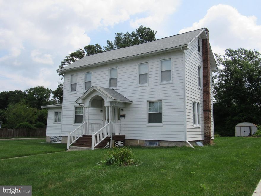 Spacious home on large corner lot.  Harwood floors thru-out. sun room or office off living room with own exit.  Three bedrooms on upper level. Main has door to small room -baby room or office. Other bedroom has a balcony outside.  Home also has a new roof.  Two full baths-0ne with shower -one with tub. One full bath is off the kitchen . Appliances include washer,dryer ,refrigerator ,gas stove dishwasher and microwave. Three window are conditioners are also included.
      Come see this home today