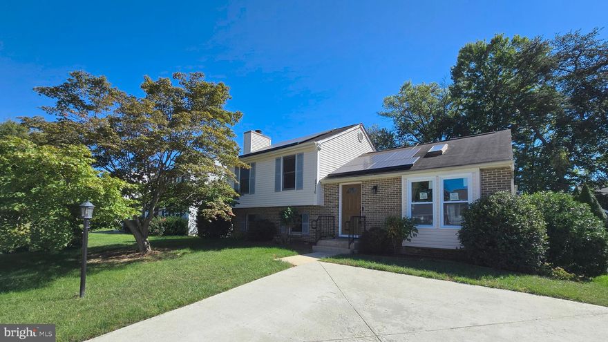 Well-maintained 4-bedroom, 2-full-bath split-level detached home located in the Heritage Woods neighborhood. The main level features an open-concept floor plan with a sunroom and an updated kitchen with granite countertops and an island. Engineered hardwood floors, cathedral ceilings, and skylights add to the charm. Just a few steps up, the upper level offers 3 bedrooms and a full bath. The owner’s suite includes a spacious sitting area with a closet, two ceiling fans, skylights, and engineered hardwood flooring. The lower level provides a versatile bedroom/den/office with a full bath, a fireplace, and additional engineered hardwood flooring. Home warranty contract until 3/5/2027 and TESLA solar systems (PPA) until 2036.