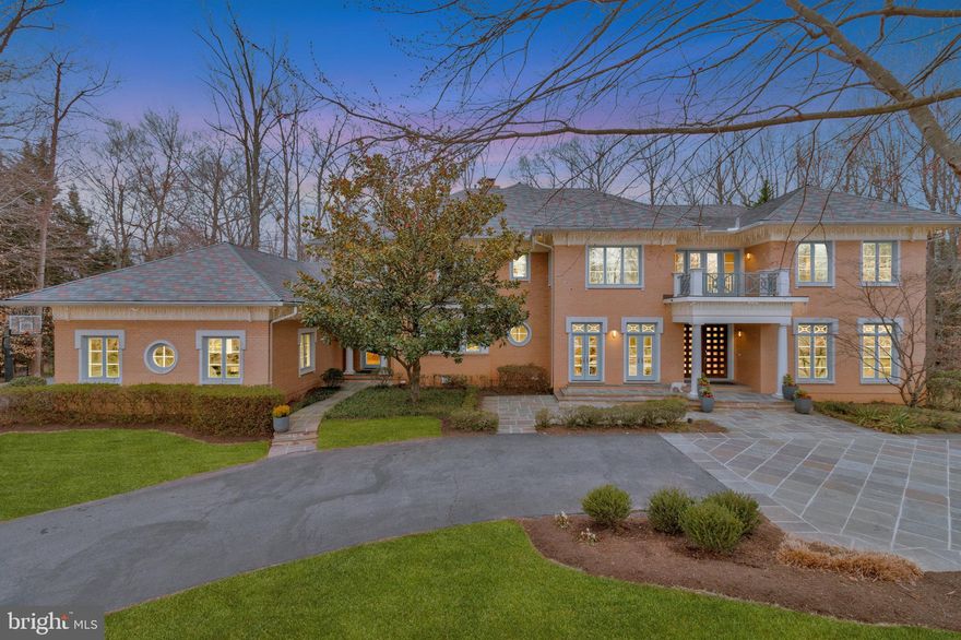 A graceful, curved driveway with a central garden and elegant fountain lead to the bluestone paved entrance and set the stage to enter this grand custom-built Mitchell, Best and Visnic residence in the region’s most coveted estate community – The Reserve.  Situated on a premium, oversized 1.25-acre corner lot, this home boasts over 10,000 square feet of luxurious living spaces with 6 bedrooms, 6 full bathrooms, 1 half bathroom and a 4-car garage.  Step through the handsome double mahogany entry doors and prepare to be amazed and delighted.  The stunning two-story foyer with its gorgeous custom chandelier, marble flooring and elongated inverted ceiling with hidden accent lighting opens to the sun-drenched living room with its floor to ceiling windows.  A well-positioned wet bar off to the left allows guests to select a beverage of their choice as they enter the home.  The bar creates the perfect atmosphere for entertaining.  An impressive staircase with wrought iron railing, four-tiered crown molding and gleaming hardwood and marble flooring throughout the main level add to the palatial feel.  On the left, a stunning Swarovski crystal chandelier glistens in the embassy-sized dining room with its two-tiered, circular recessed ceiling and twin double French doors to access the bluestone patio out front.  The spectacular study to the right with maple built-ins includes an attached full bathroom and doubles as a main level bedroom.  Down the hall, step into the warm and inviting family room with its prominent double-sided fireplace with raised marble hearth and surround. Beautiful maple built-ins, a wall of windows and a door to access the bluestone patio out back complete the space.  The other side of the fireplace includes the heart of the home -- the expansive gourmet kitchen and breakfast room with its built-in maple bookshelves and built-in home office workspace.  Curl up with a good book in the large, cushioned window seat overlooking the manicured grounds.  The kitchen inspires any chef with its full suite of professional-quality stainless steel appliances, spacious center island, polished granite countertops and sleek custom cabinets.  A back staircase from the kitchen leads to the expansive owner’s retreat which features an elongated arched ceiling with accent lighting, a private balcony overlooking the rear of the tree-lined lot, a gracious gas fireplace with marble surround, elegant maple built-ins, spacious his and her walk-in closets with custom built-ins and an indulgent spa quality bathroom.  Three secondary bedrooms add the finishing touch to the upper level, each with ample walk-in closets and luxurious ensuite bathrooms.  Not to be missed, the lower level caps off this entertainer’s dream with large format porcelain tile flooring throughout, a full service wet bar with granite countertops, fun dance floor, convenient caterer’s kitchen, gas fireplace with raised stone hearth and surround, media room, billiards room, exercise room, guest bedroom, full bathroom and walk out to lovely bluestone patio.  On this oversized lot, there is plenty of room for a pool, pool house and pavilion.  Two sets of plans with several options are available.