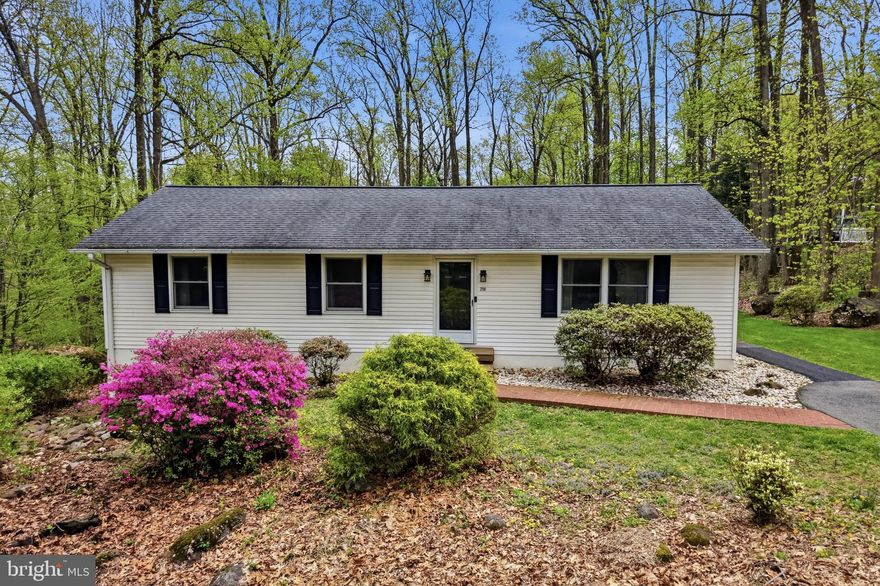 Nestled on a private cul-de-sac and set on a serene 1-acre lot in upper bucks county, this beautifully maintained ranch home offers the perfect escape from the everyday. Sunlight pours through oversized windows in the inviting living room and spacious dining area. Hickory hardwood floors create warmth throughout the first floor with welcoming spaces to gather and unwind. The updated kitchen is the heart of the home, featuring ample cabinetry, generous counter space, and easy access to a two-tiered deck—ideal for grilling and outdoor entertaining. The main level includes three comfortable bedrooms and a full bath, while the finished walk-out lower level is designed for entertaining, complete with a large family room, pellet stove, built-ins, serving area, bonus room for a home office or playroom, plus a half bath, laundry, and extra storage. Outside, the expansive yard offers endless possibilities—from hosting gatherings to enjoying peaceful evenings surrounded by nature. For all your lawn and garden needs you’ll find an oversized shed in the back yard with lots of storage. All of this privacy and space, just minutes from major routes and everyday conveniences—truly the best of both worlds!